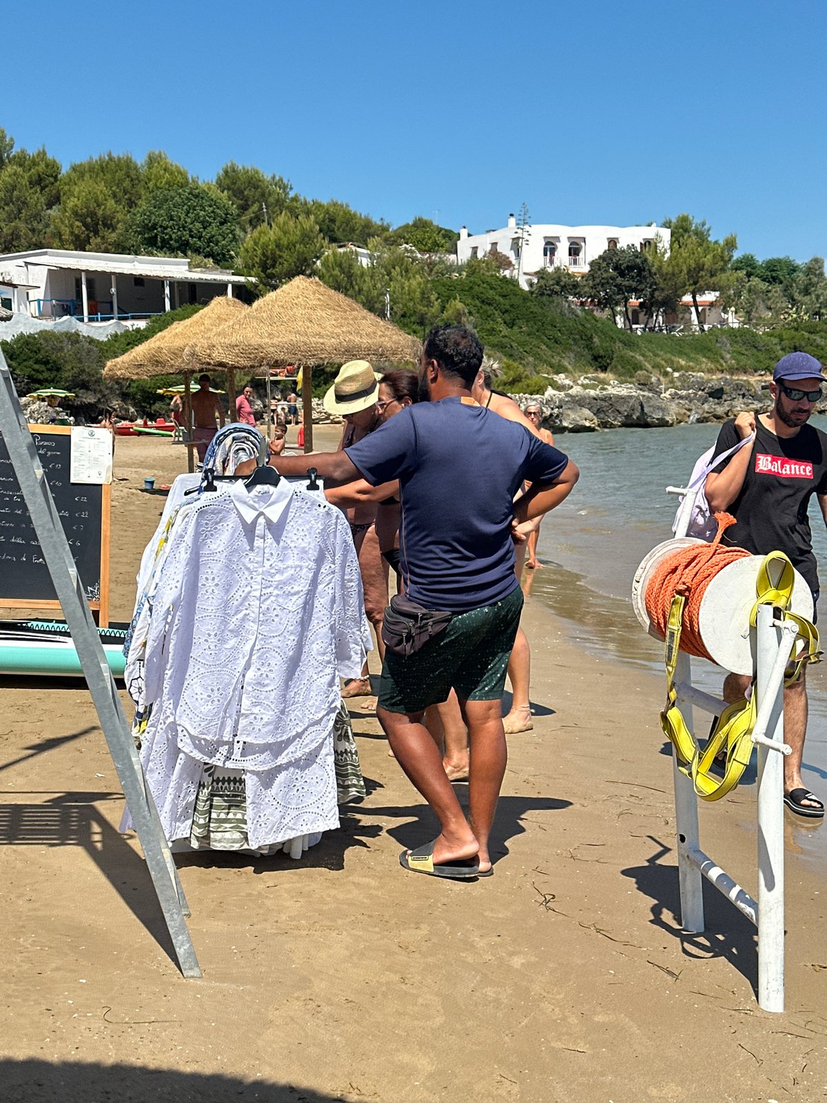 Beachside shopping and snacks at a Peschici market stall
