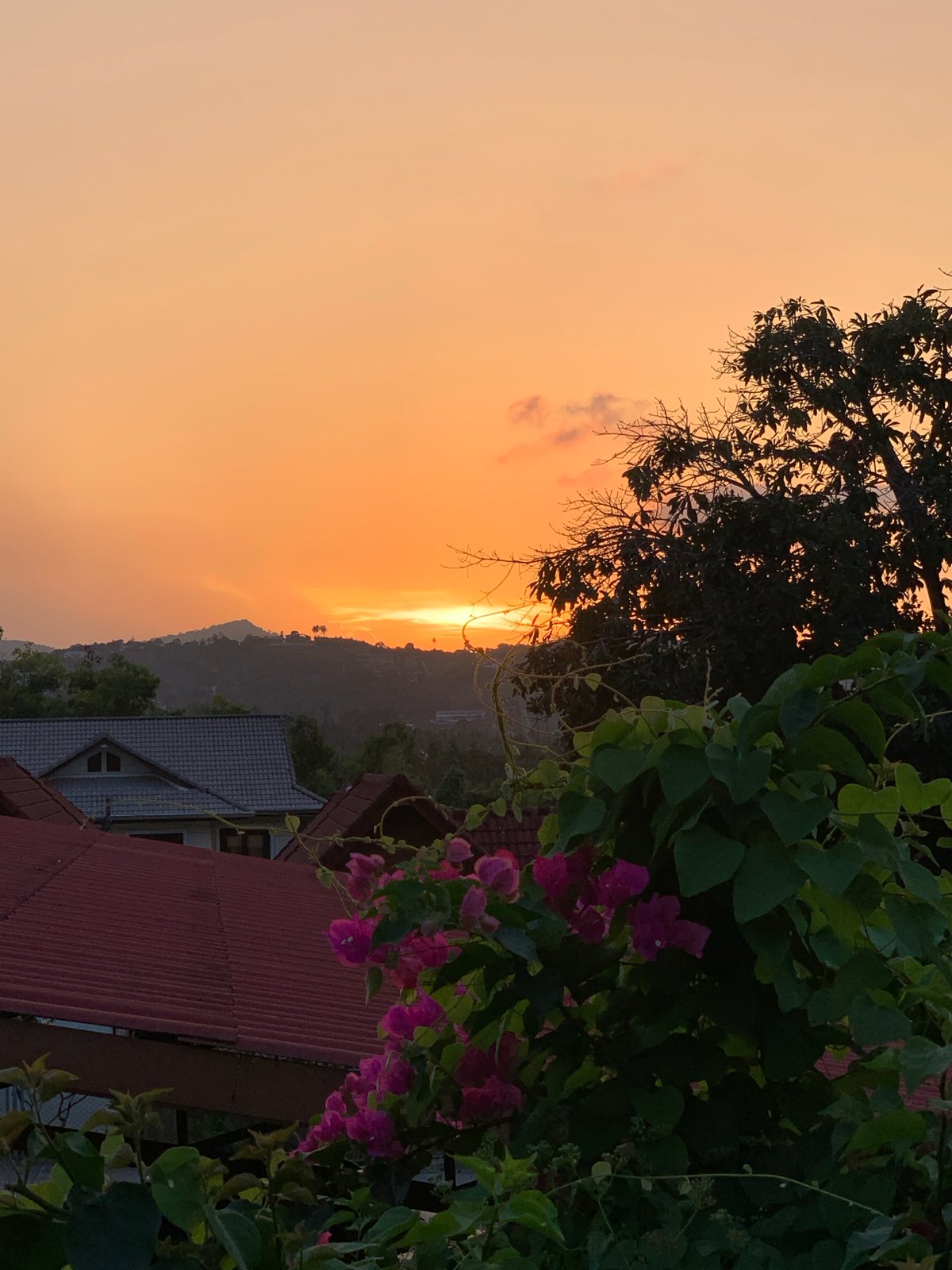 Sunset documented over mountainous landscape in บ้านบางรักษ์, Thailand