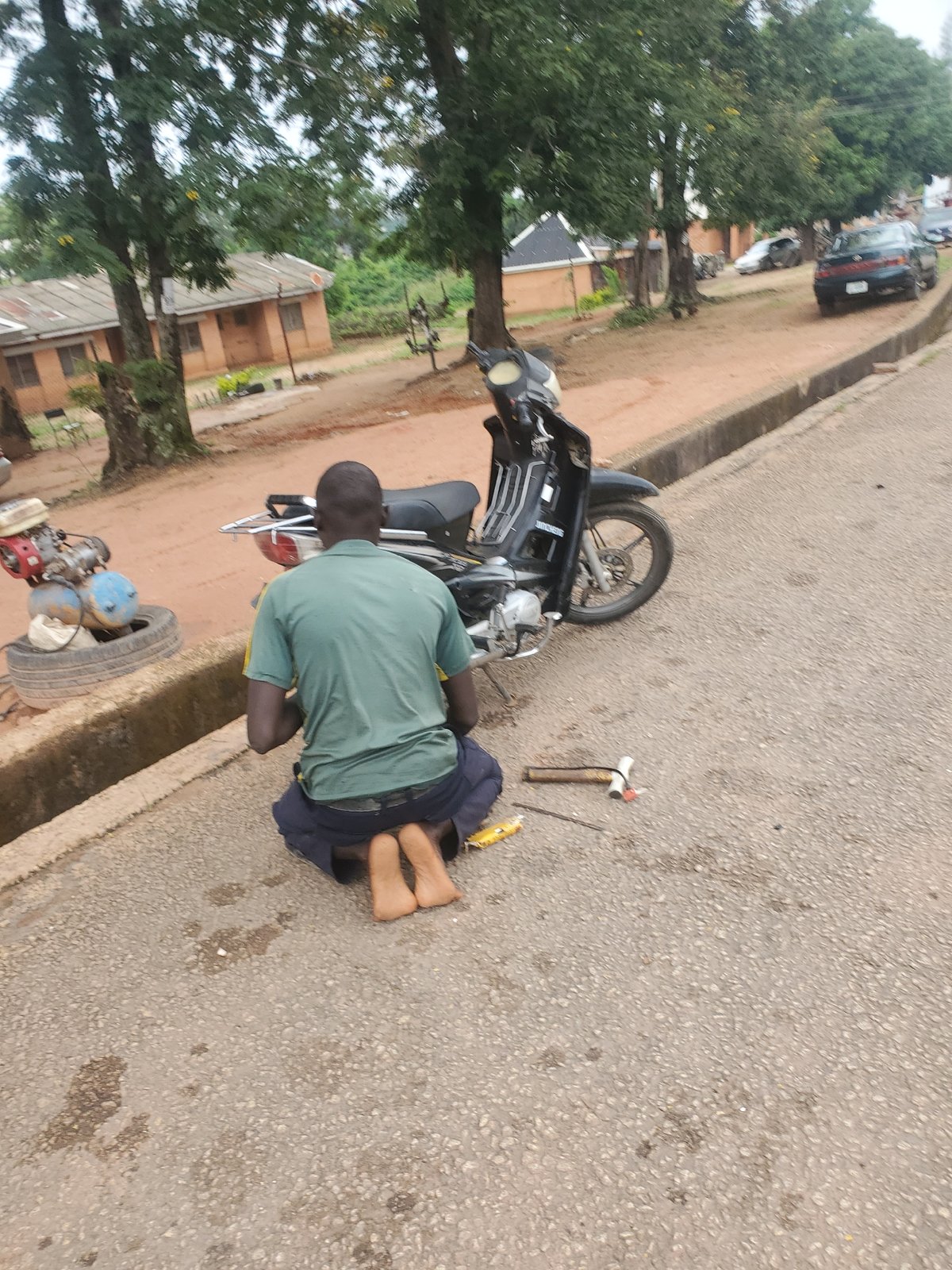 Morning street scenes from Jos, Nigeria under cloudy skies
