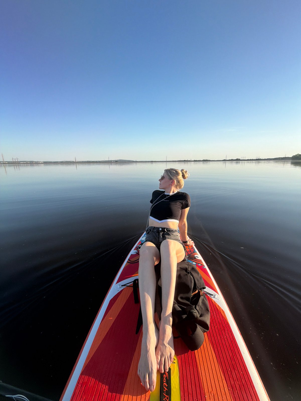 Paddleboarding session documented along Noviy Russia waterway