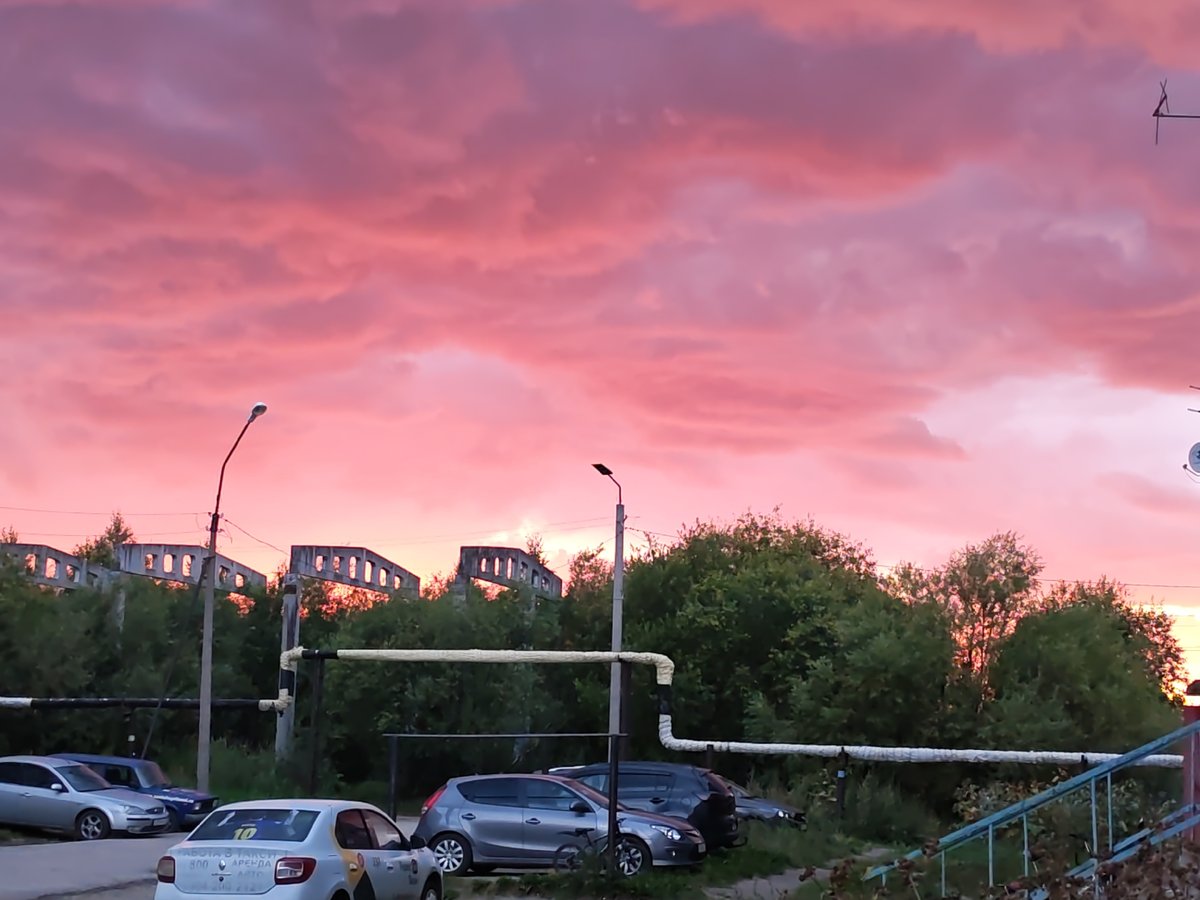 Bright summer sunset over a Syktyvkar street in August