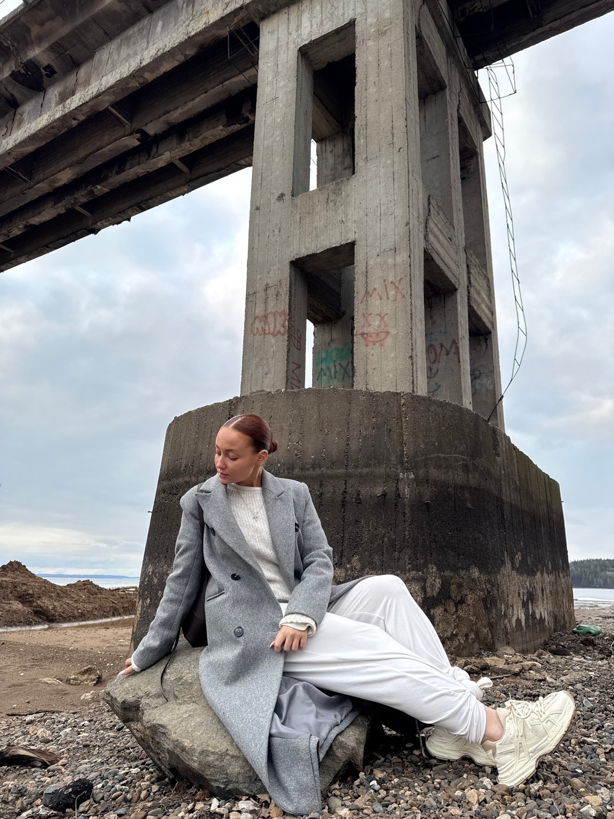 Mother and child explore industrial ruins in Chaikovsky, Russia