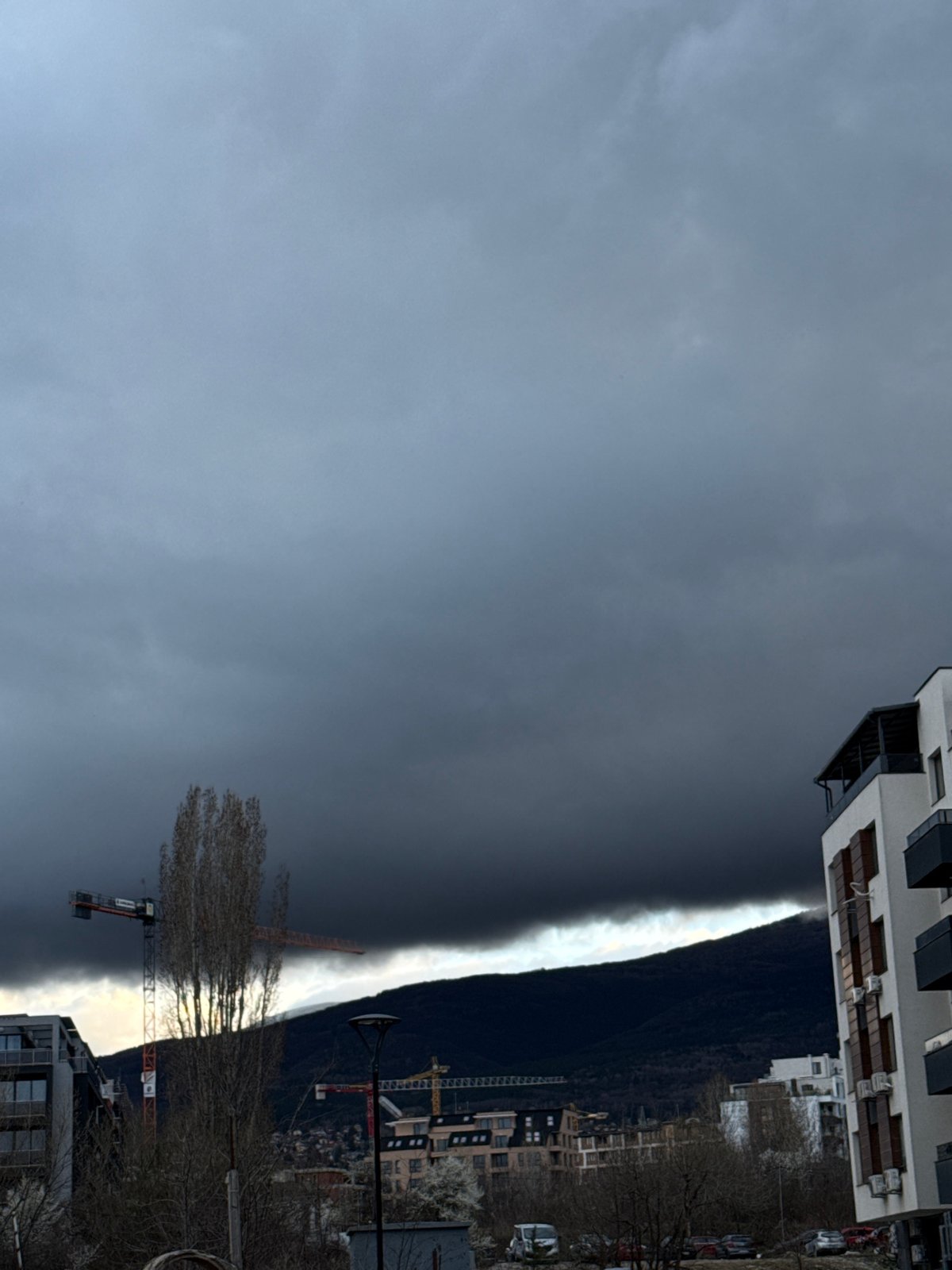 Sunlight breaks through clouds over Sofia mountains Friday afternoon