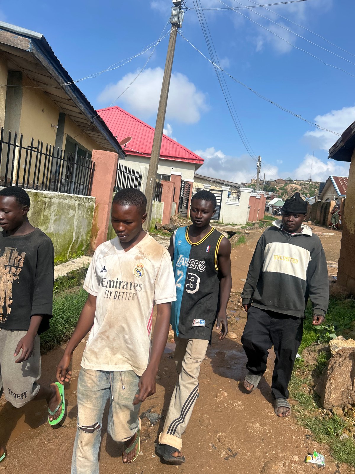 Street life and commerce across Jos, Nigeria on a July morning