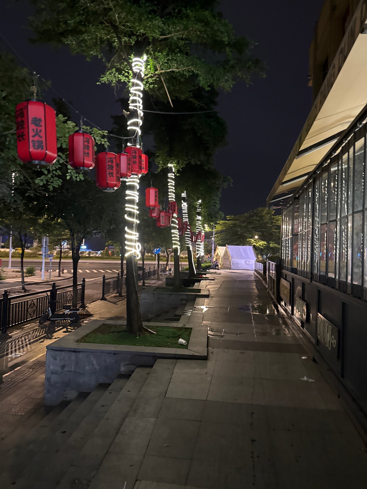 Haizhu District street at night, lanterns and local restaurants