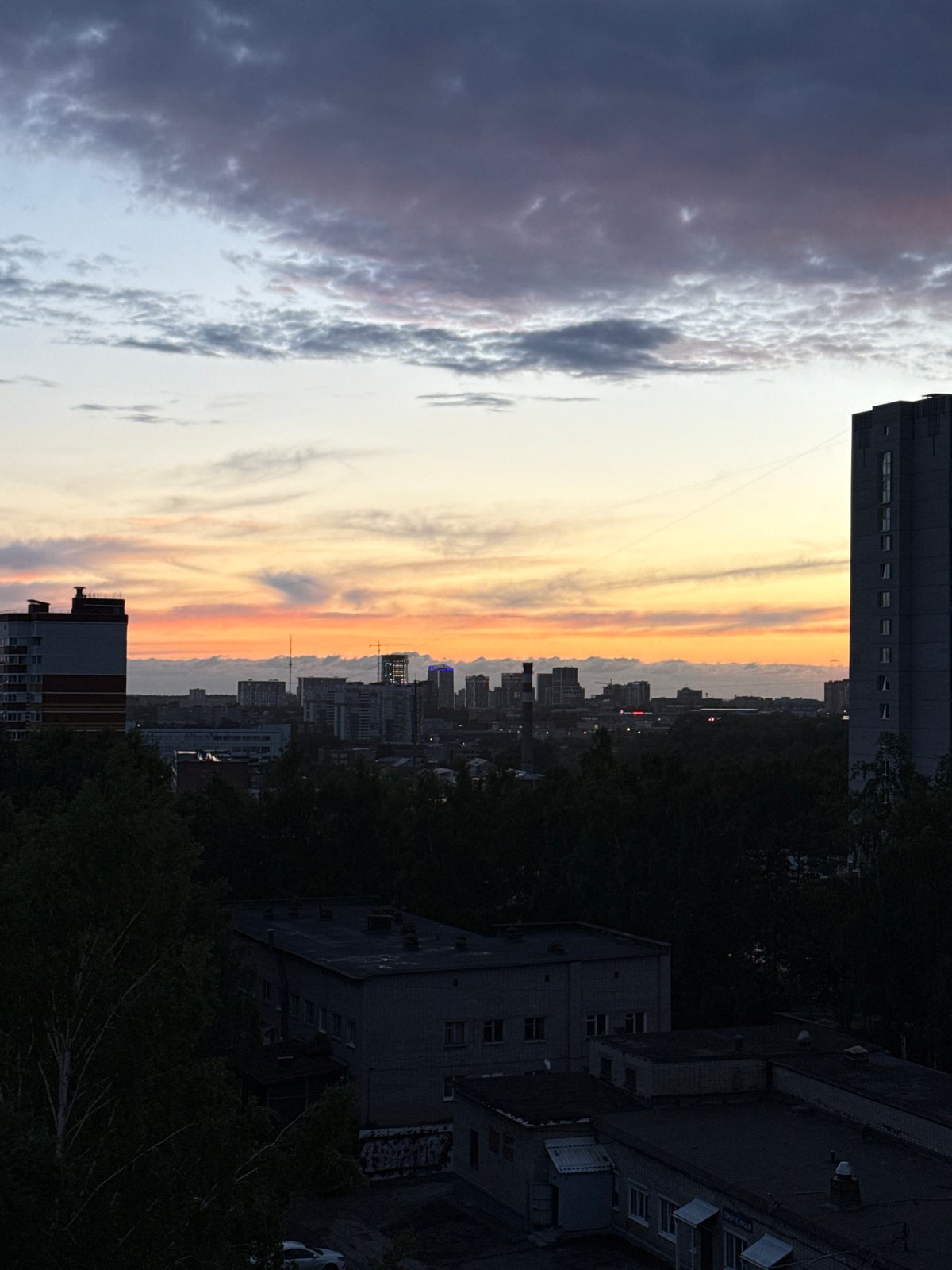 Evening sunset documented across Izhevsk, Russia apartment districts