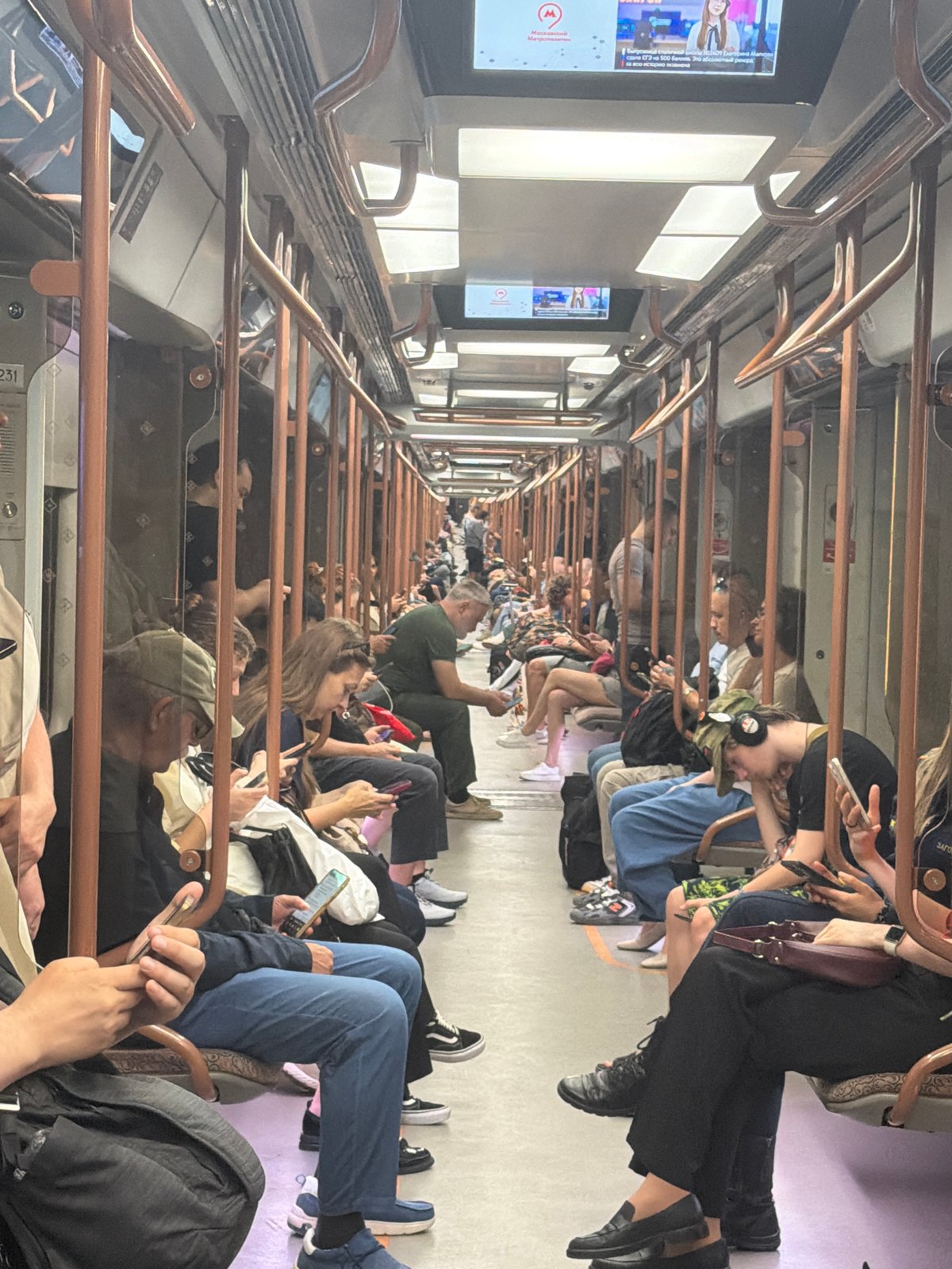 Inside a busy subway: passengers, tunnels, and escalators