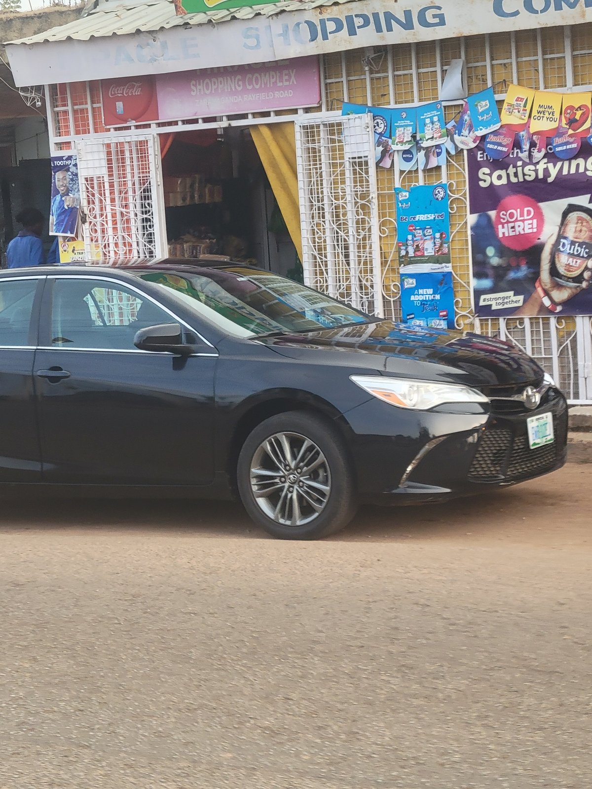 Nigerian street scenes documented during evening commercial activity