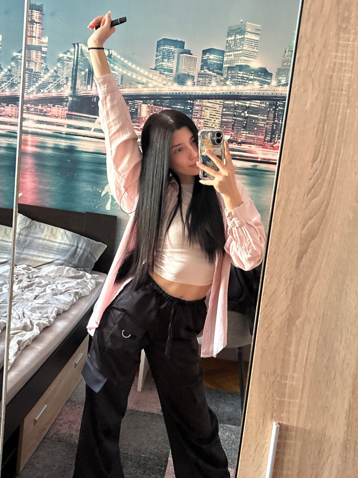 Woman documents selfies and design work in Sofia afternoon