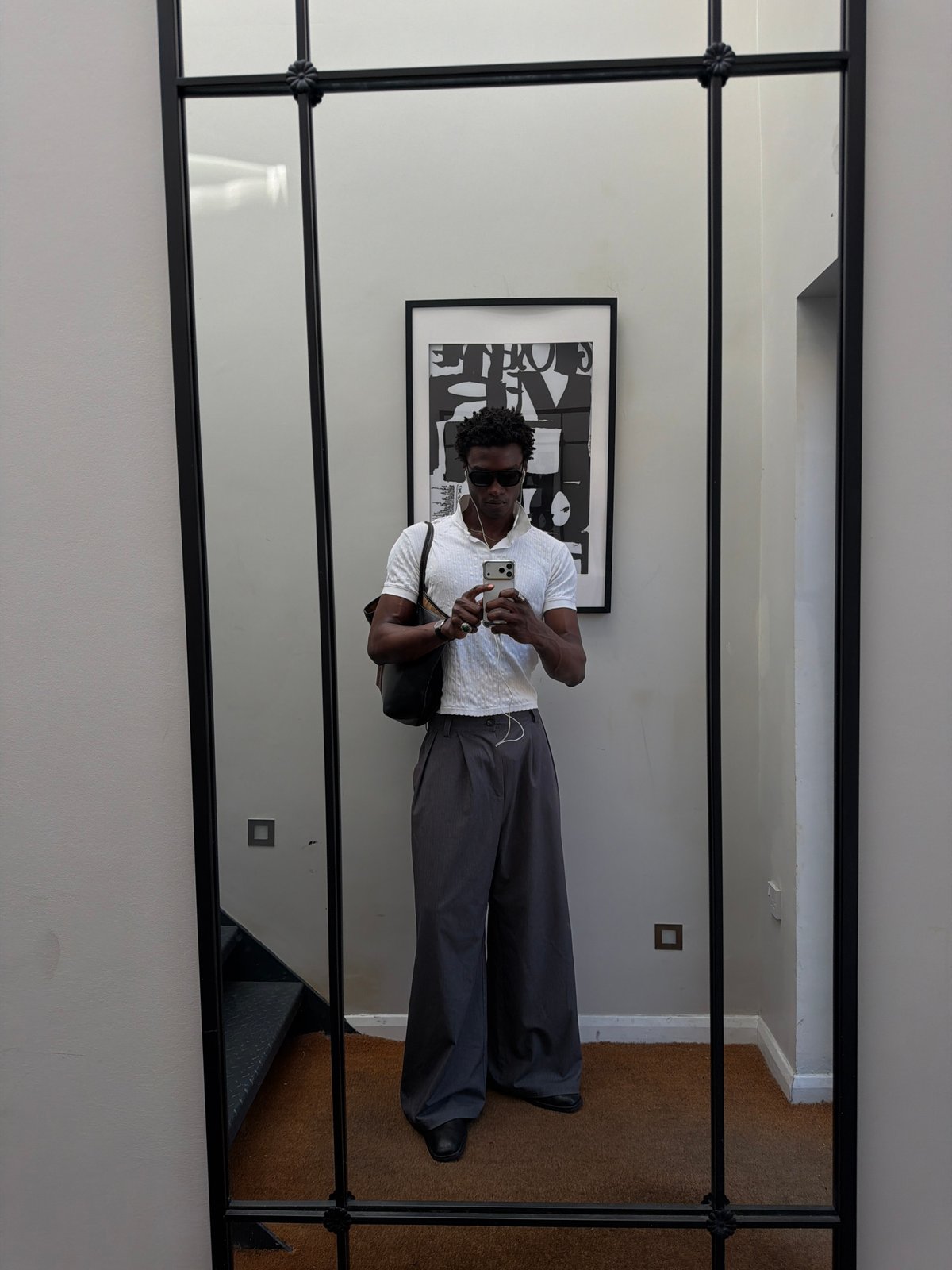 Hallway mirror selfie, sharp casual outfit in London