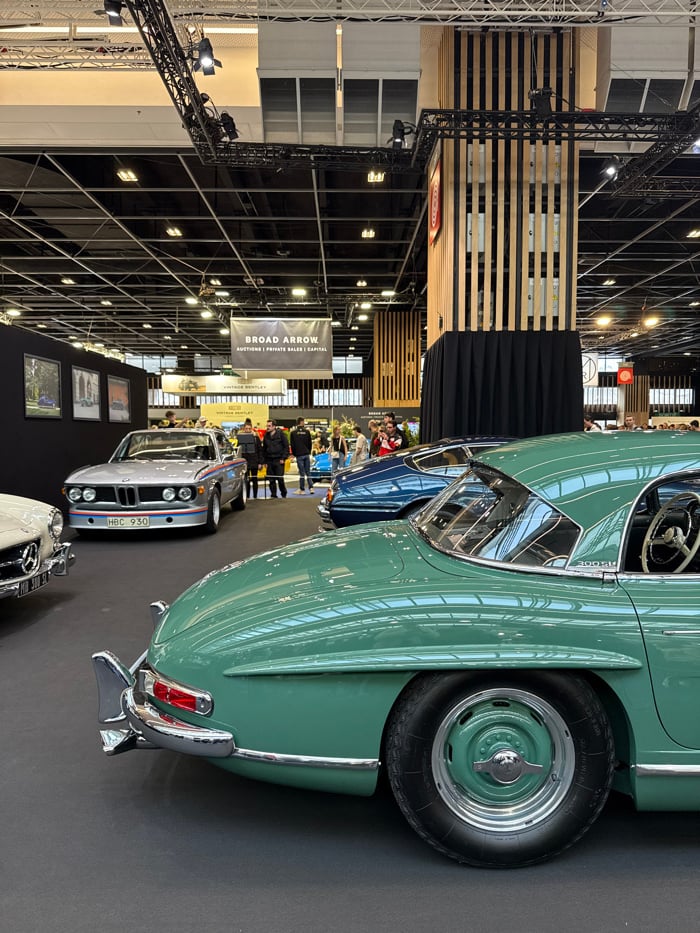 Classic car exhibition documented in Vanves exhibition hall