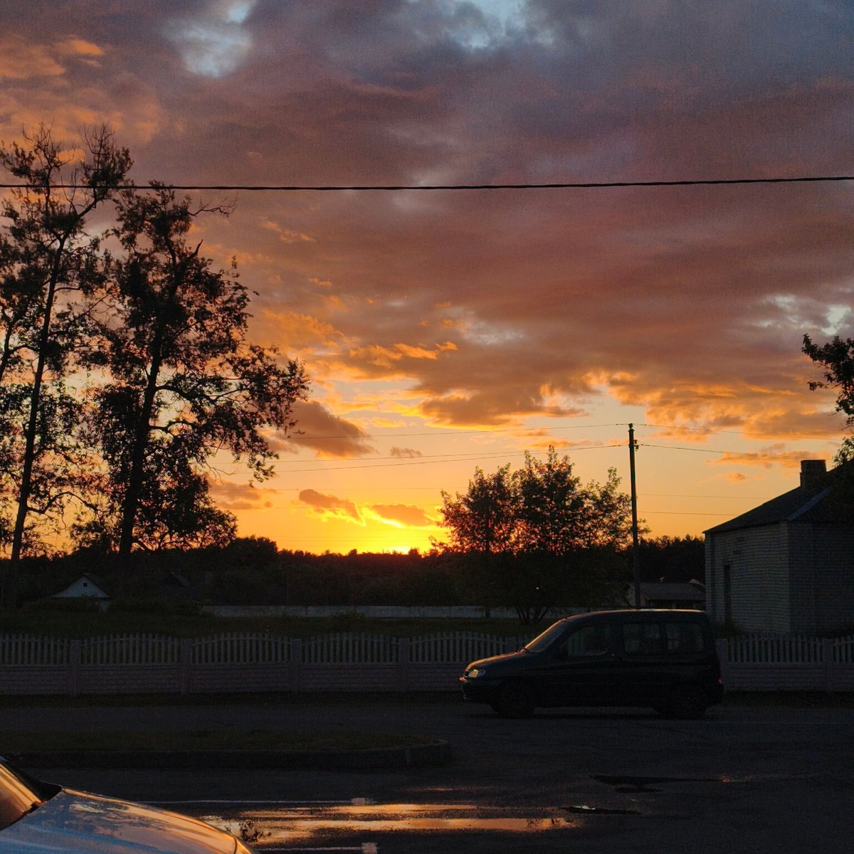 Sunset documented across residential Парэчча, Belarus neighborhood