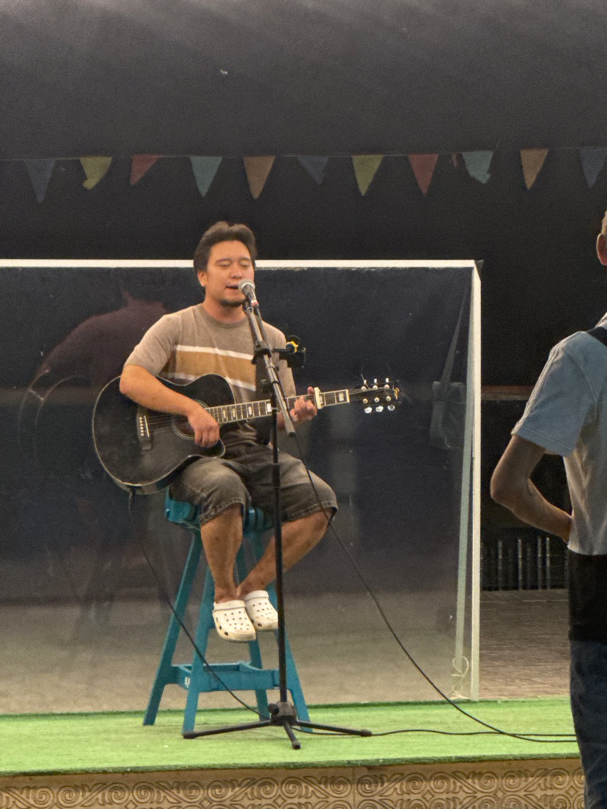 Live acoustic street performance at Pavlodar waterfront promenade