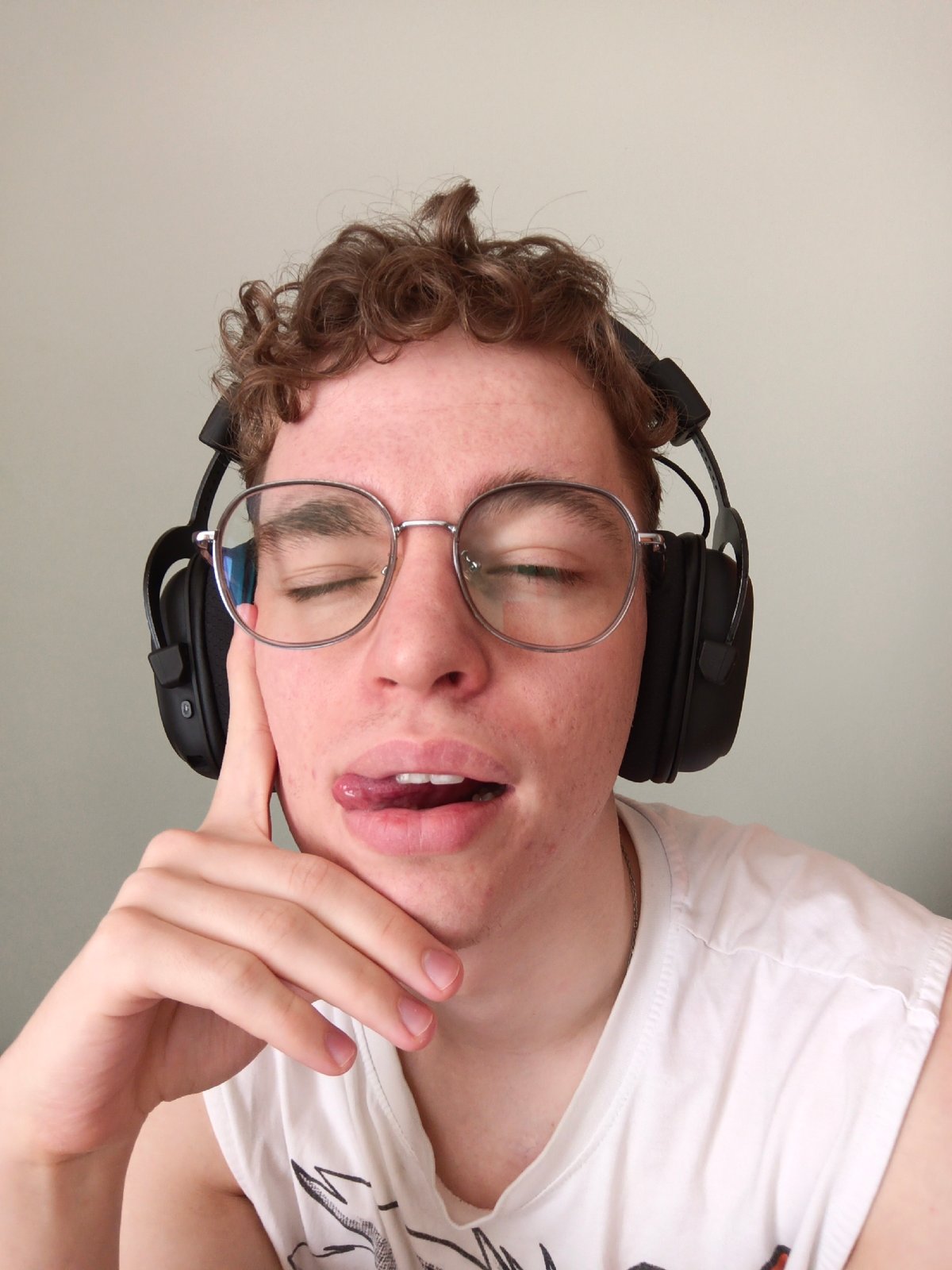 Young man takes headphone selfies in Odintsovo, Russia
