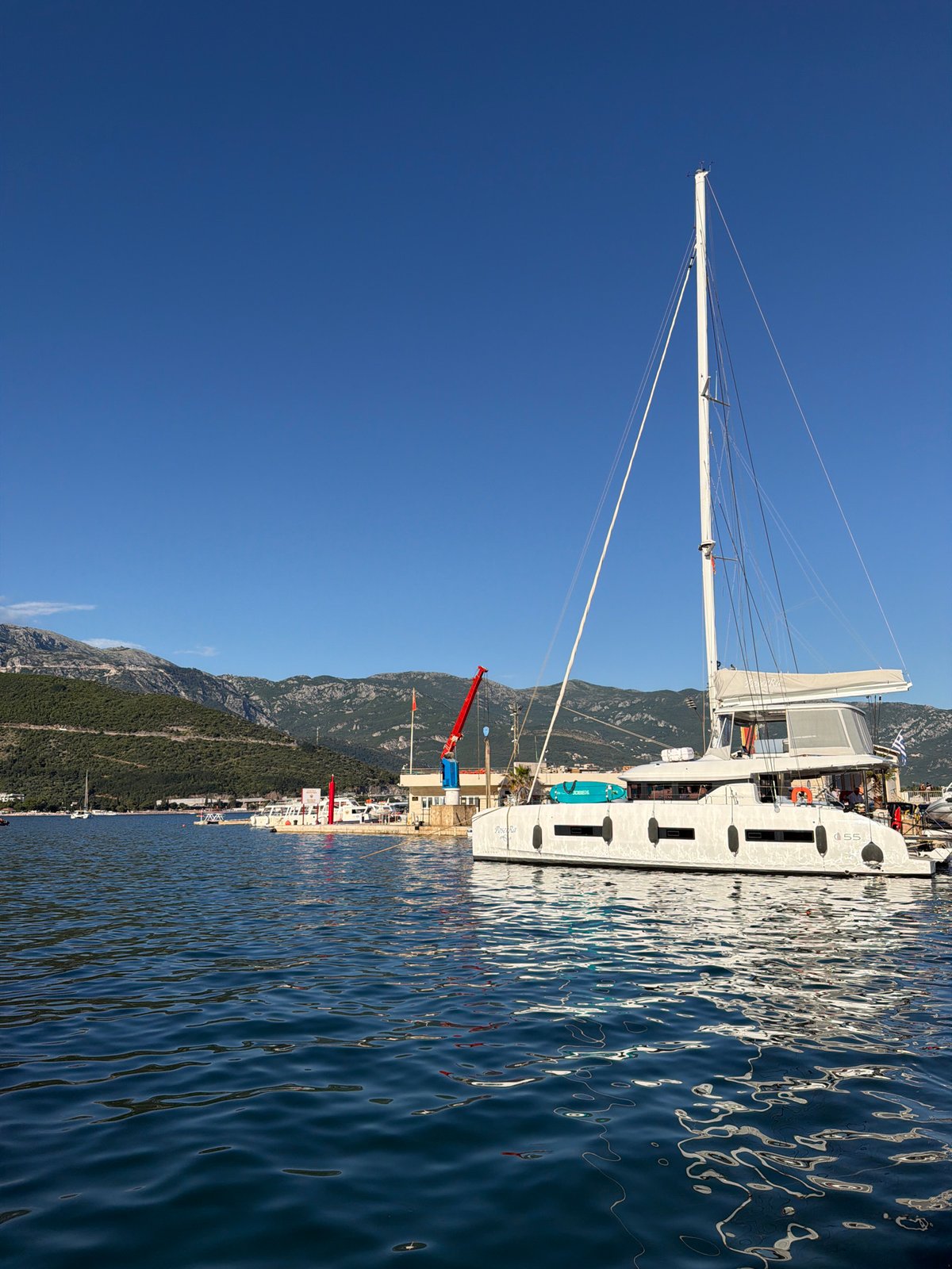 Budva marina and waterfront buzzing on a sunny afternoon