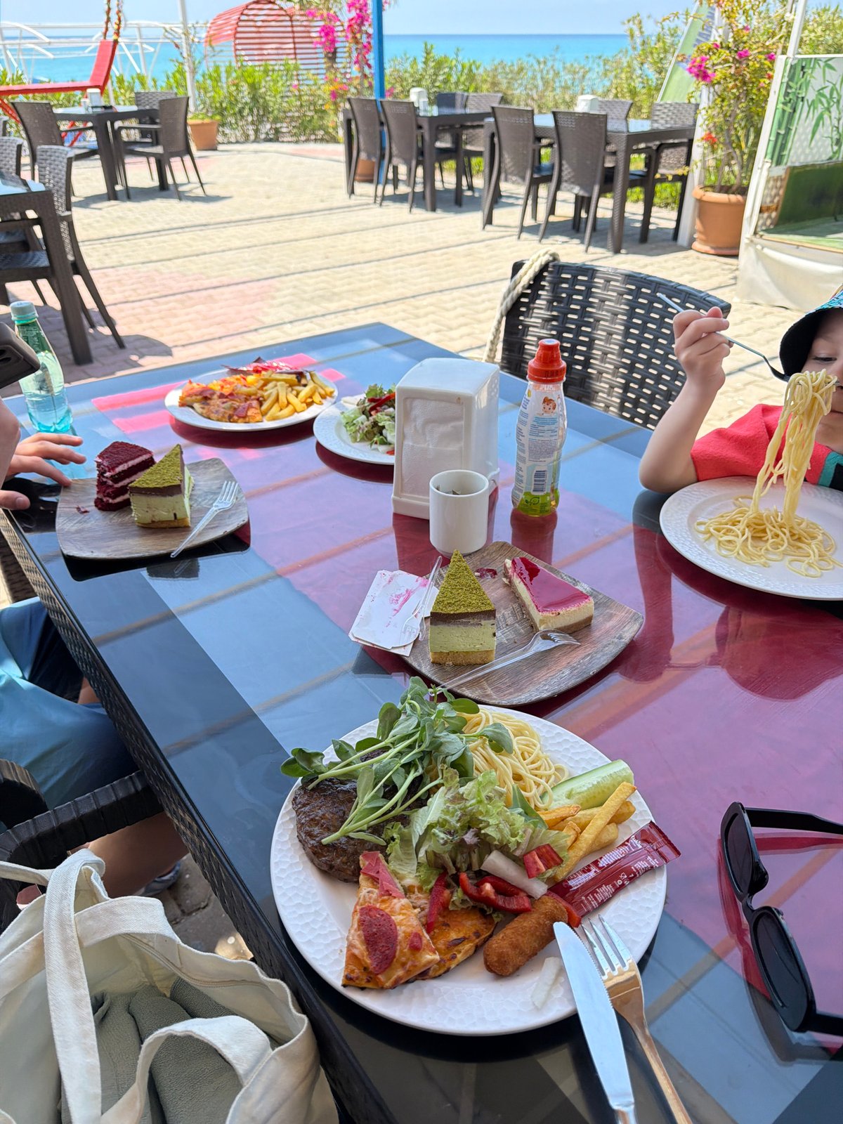 Outdoor dining captured at seaside restaurant in Manavgat, Turkey