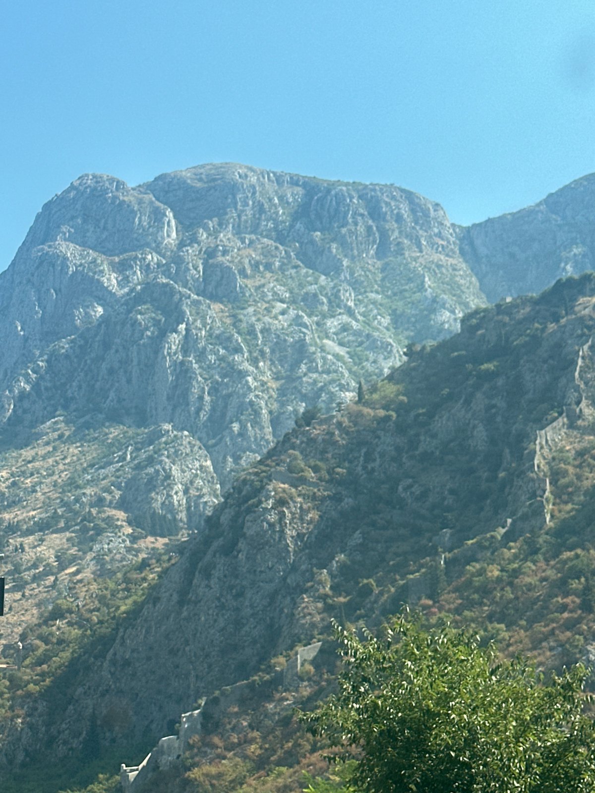 Morning drive through Škaljari with mountain views