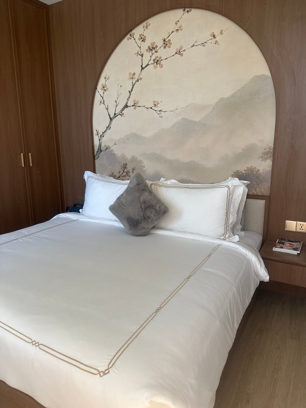 Inside and outside a tidy white-walled accommodation