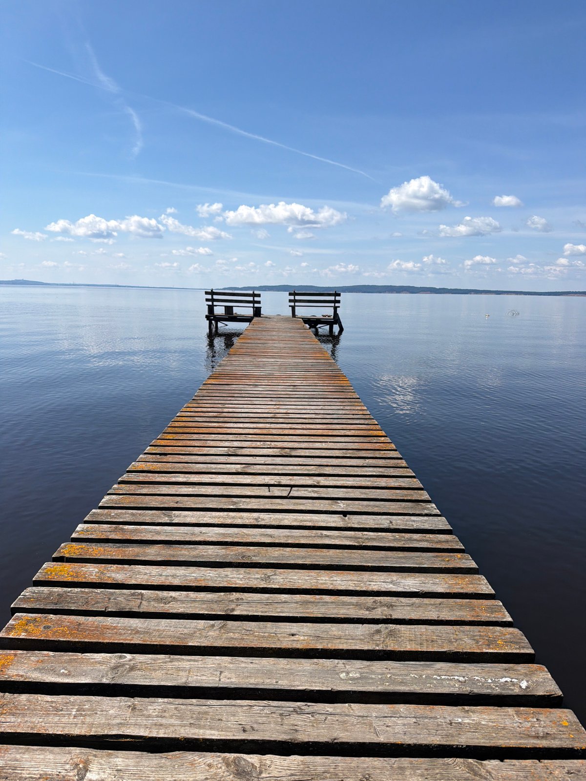 Hanging out on a lakeside pier in Stepanovo on a clear morning