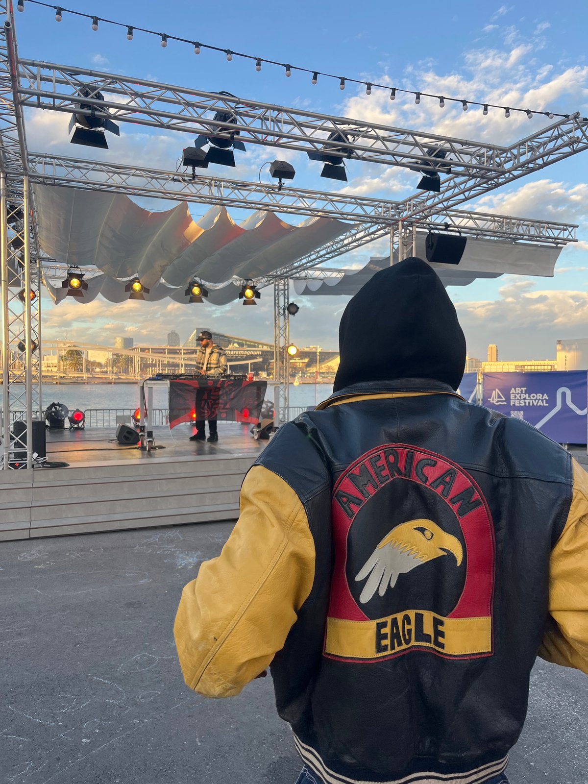 DJ performs outdoor set at Barcelona marina