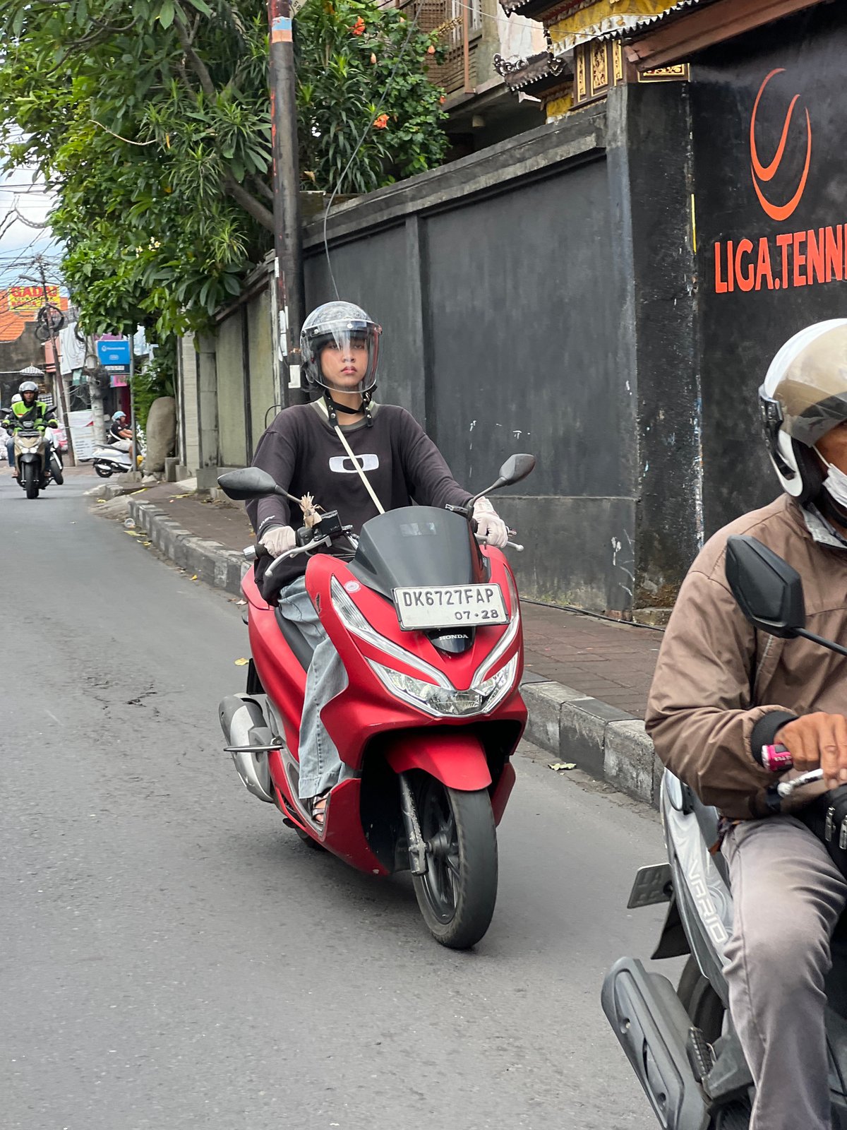 Morning scooter traffic documented in North Kuta, Indonesia