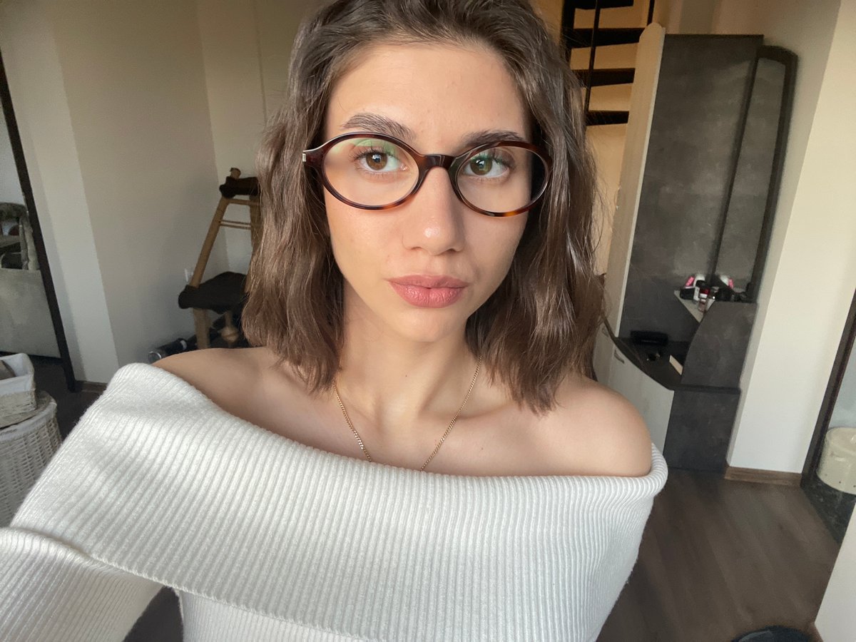 Woman takes selfies indoors in Sofia apartment