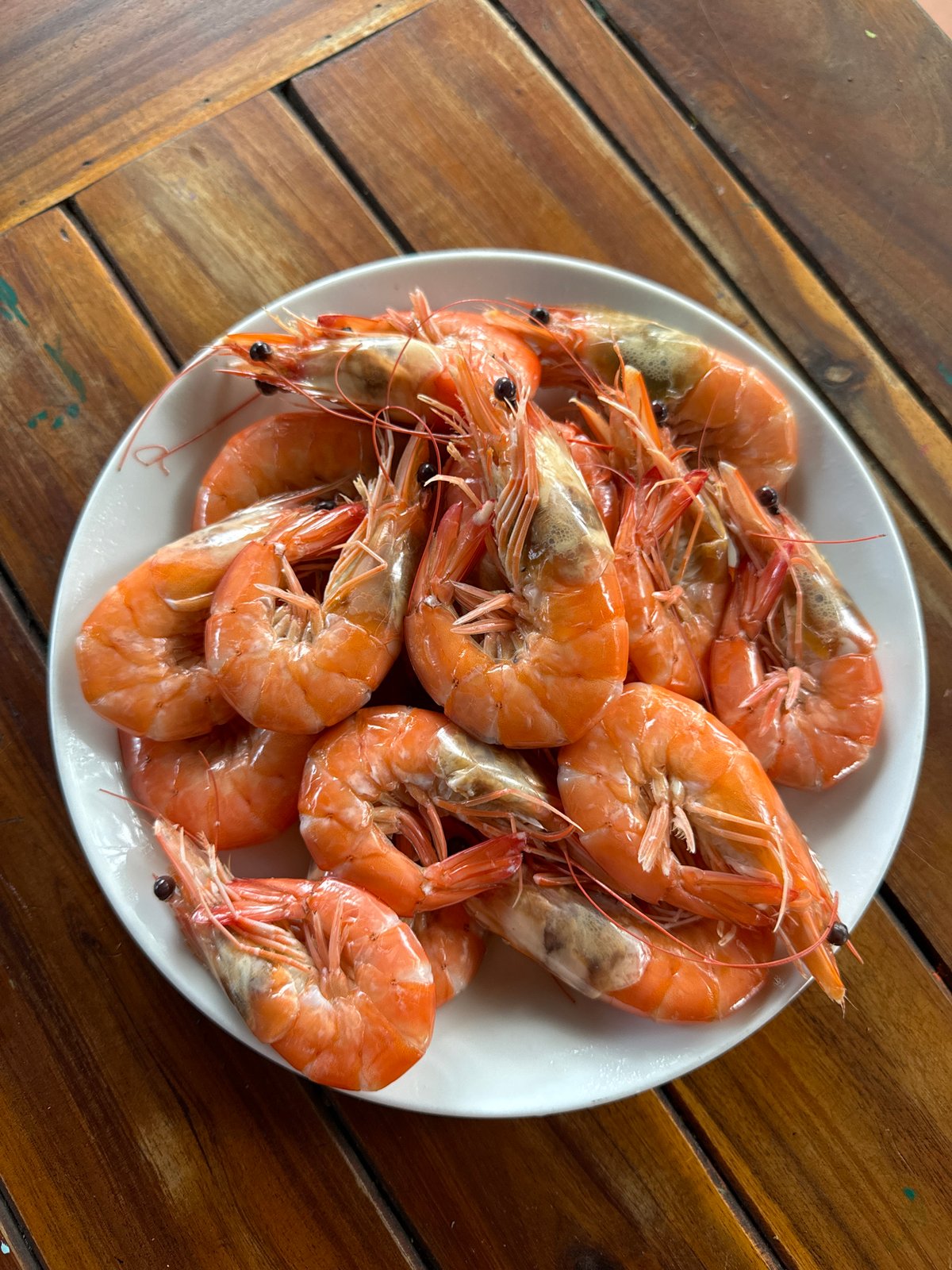 Morning shrimp feast shared at outdoor restaurant in Mũi Né