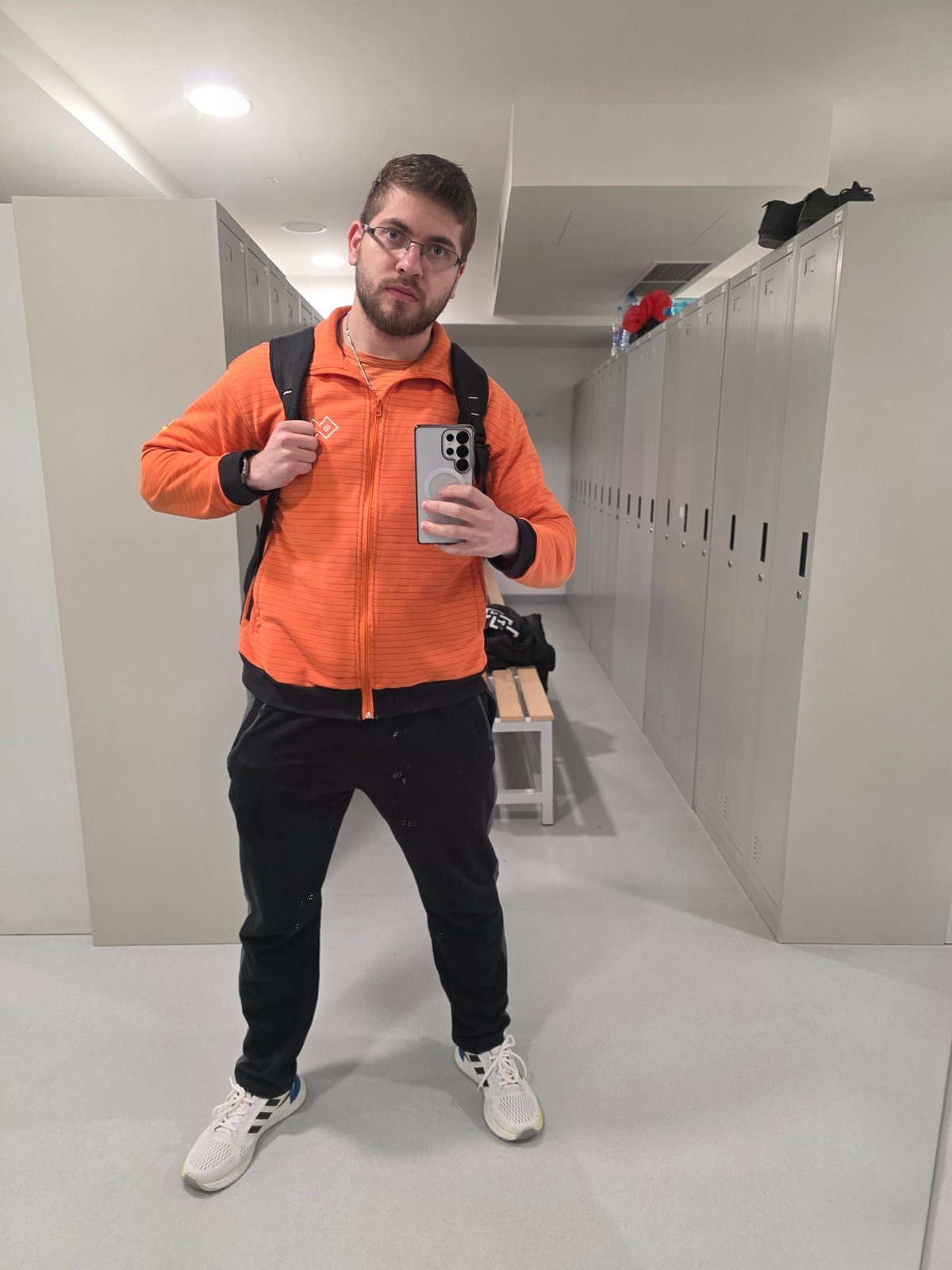 Man in orange BTJ jacket spotted at multiple Plovdiv locations