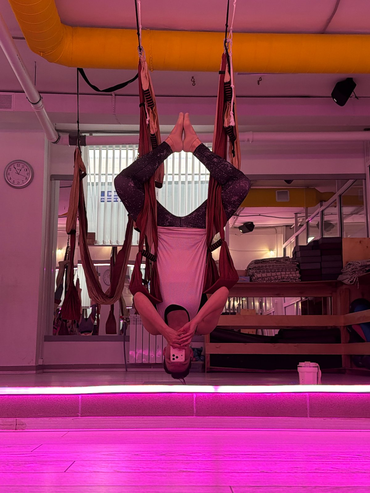 Aerial yoga session underway at a Chaikovsky studio