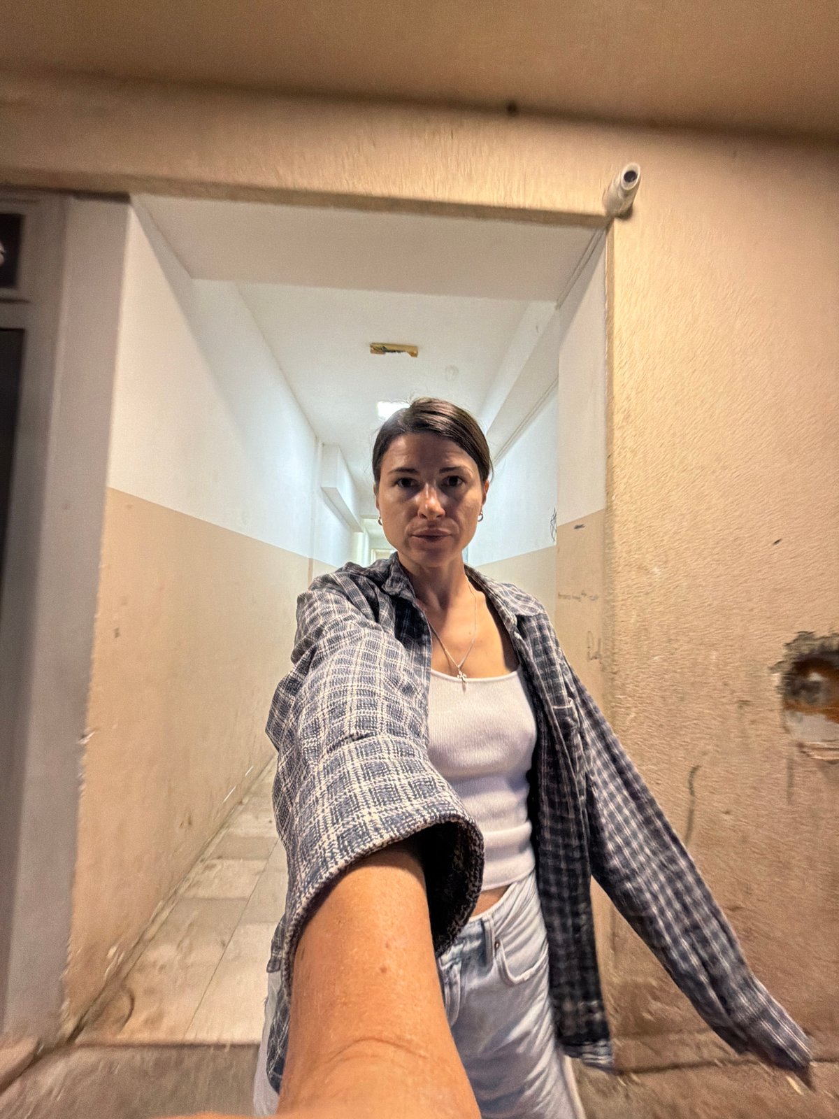 Woman documents journey through Montenegro village with selfies, car shots