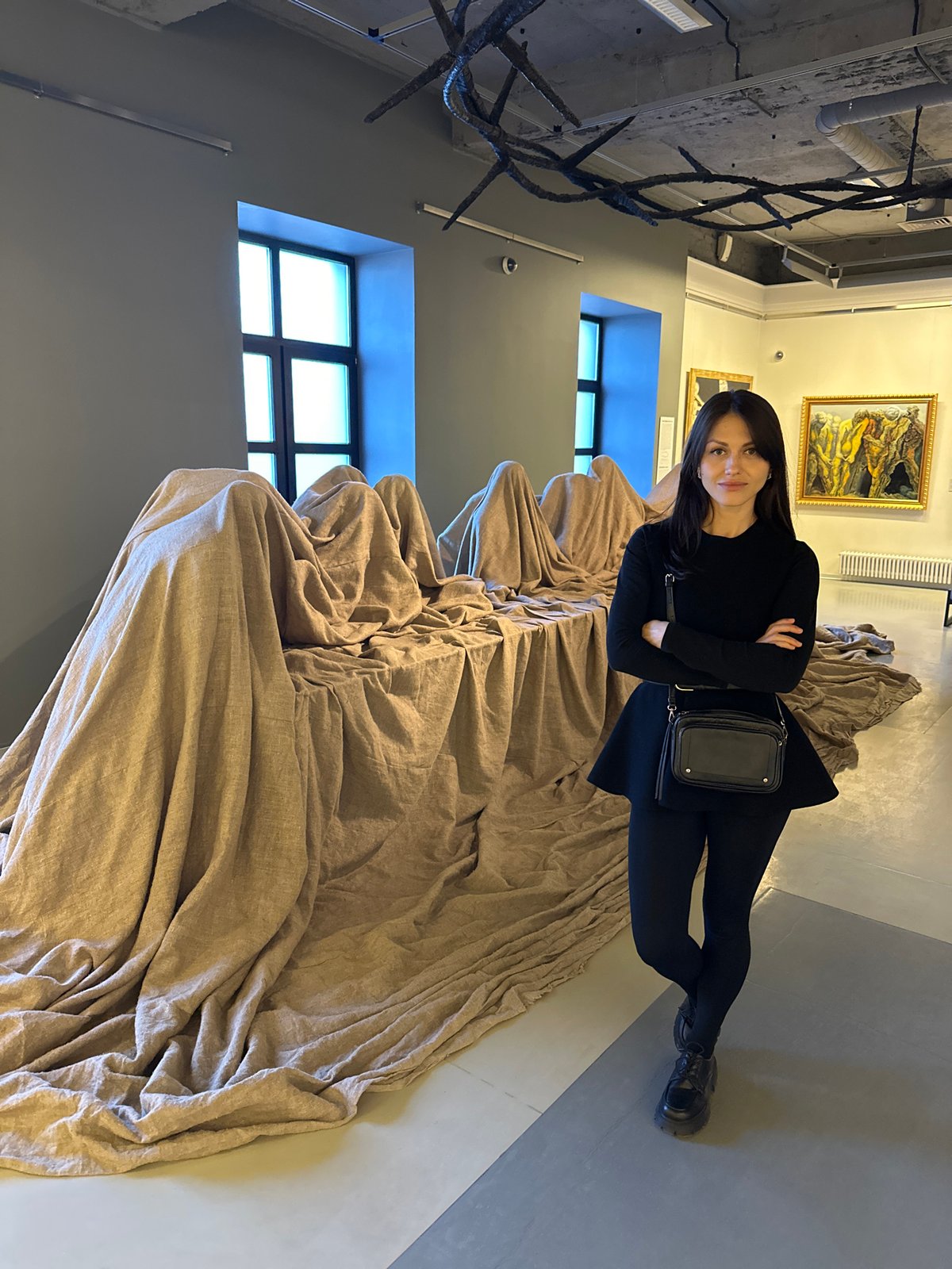 Gallery visitor explores art installations in Saint Petersburg