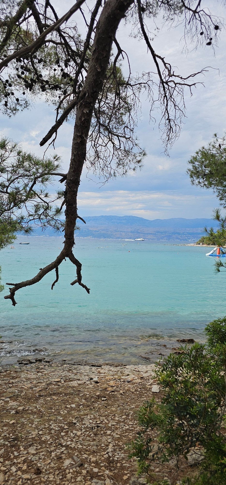 Supetar's Adriatic shoreline, from beach to floating water park