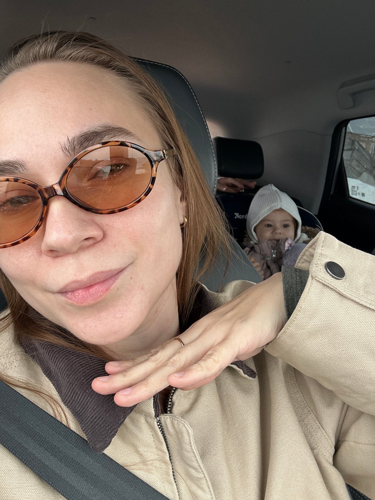 Woman documents daily life with baby and pet cat
