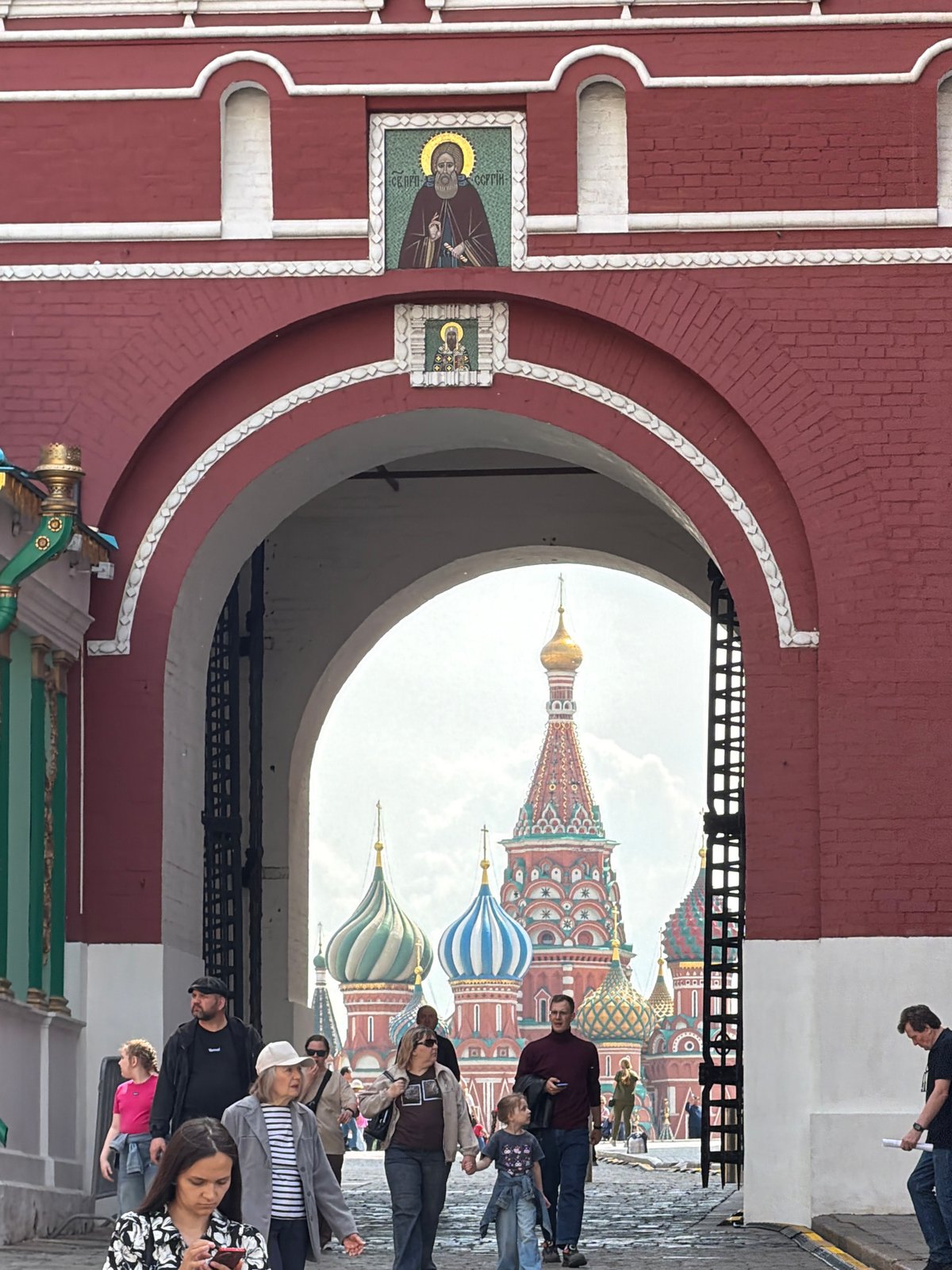 St. Basil's Cathedral photographed through ornate archway in Moscow