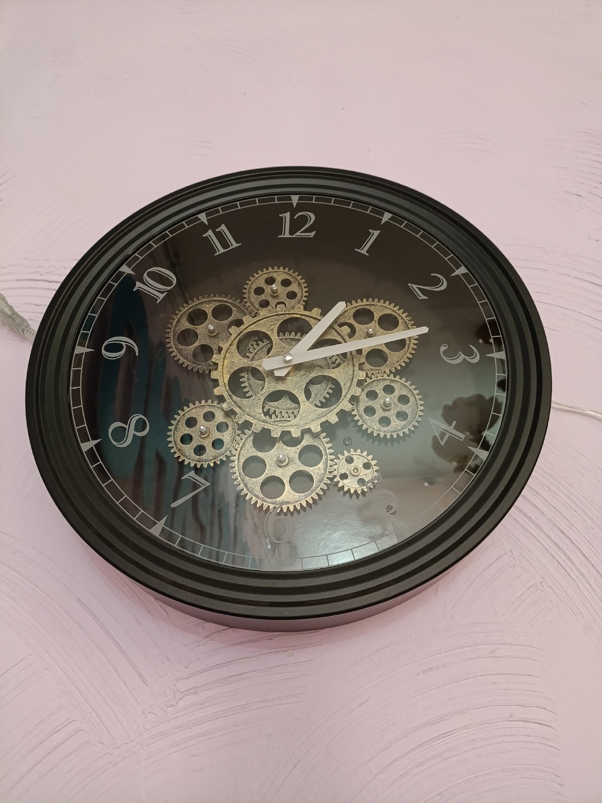 Decorative gear clock observed in Chaikovsky, Russia