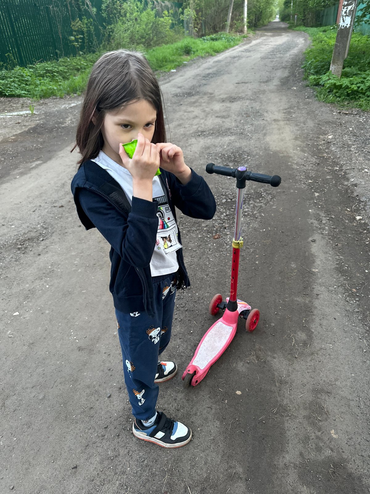 Family outing with children and scooter captured in Pushkino