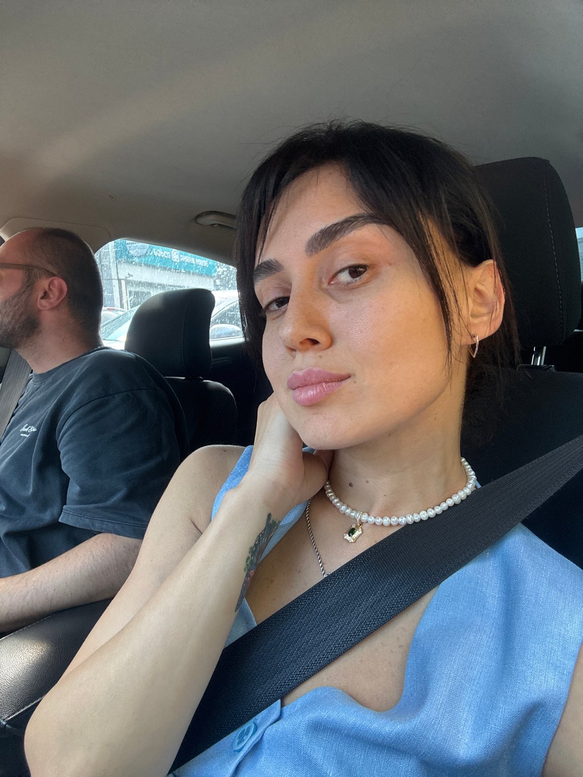 Car ride through midday Tbilisi traffic, selfies and street scenes