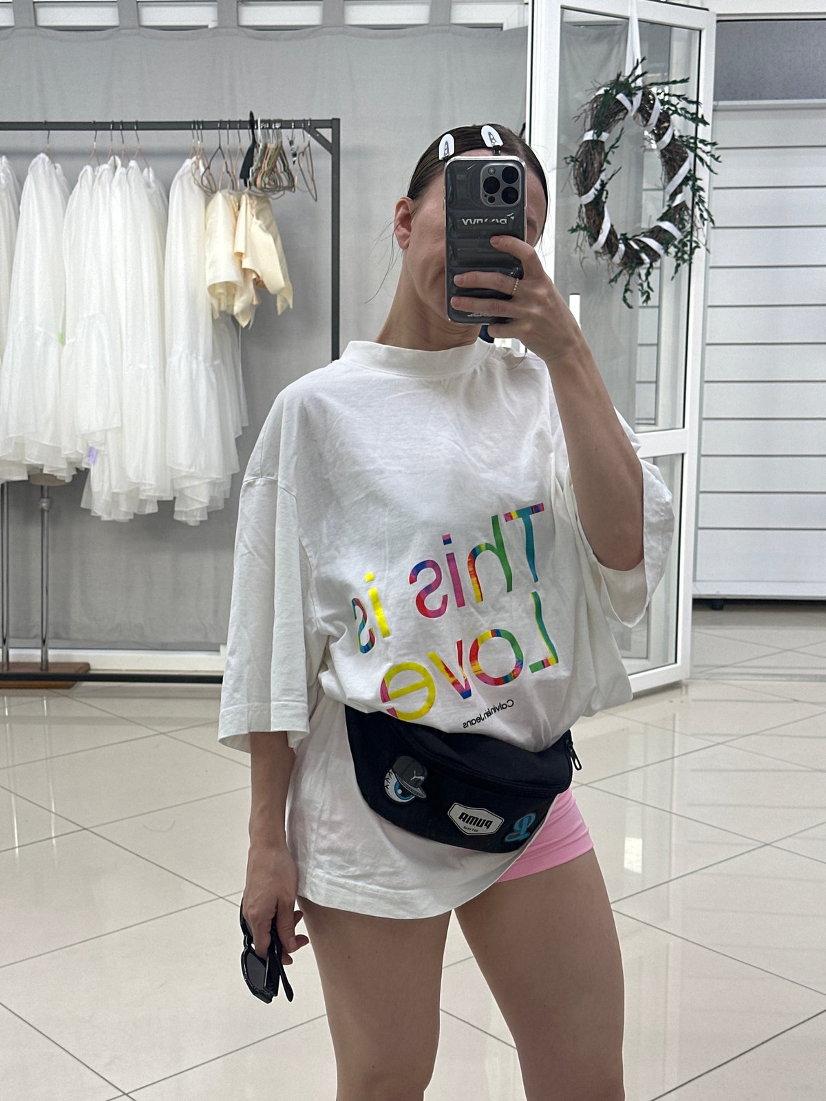Women photograph themselves in Votkinsk clothing design studio
