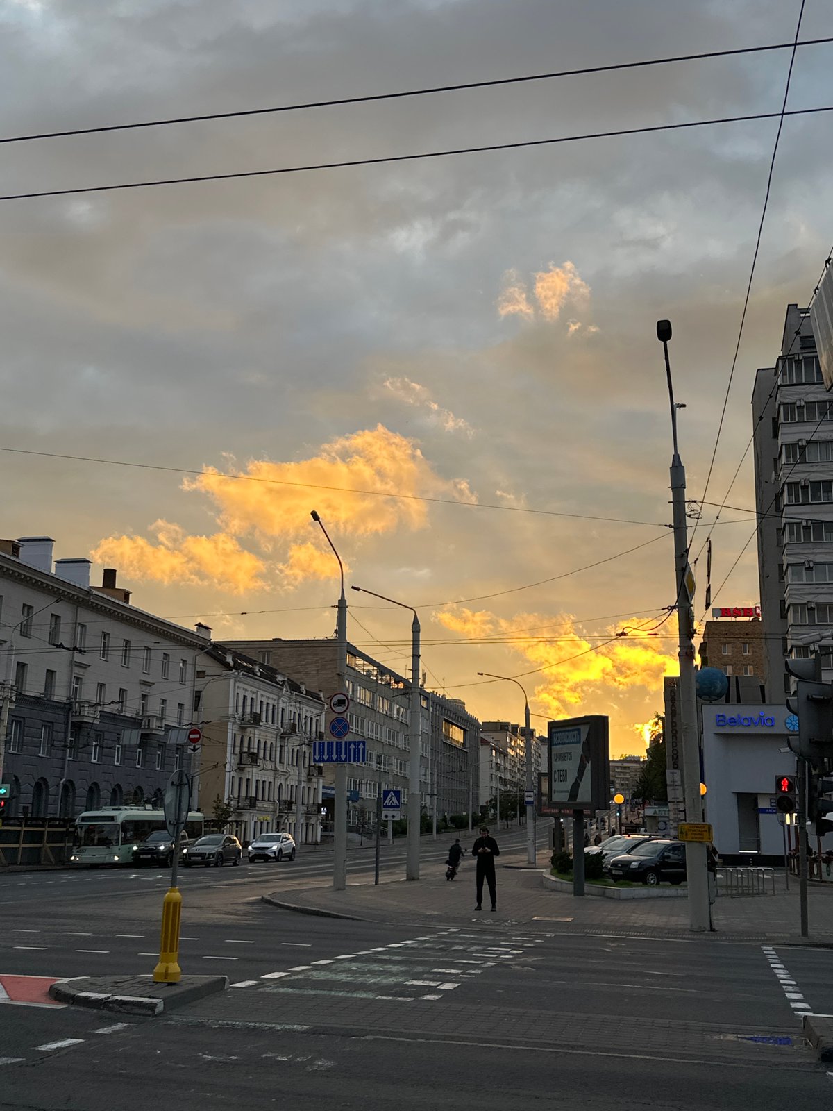 Evening street scenes documented across Minsk during sunset
