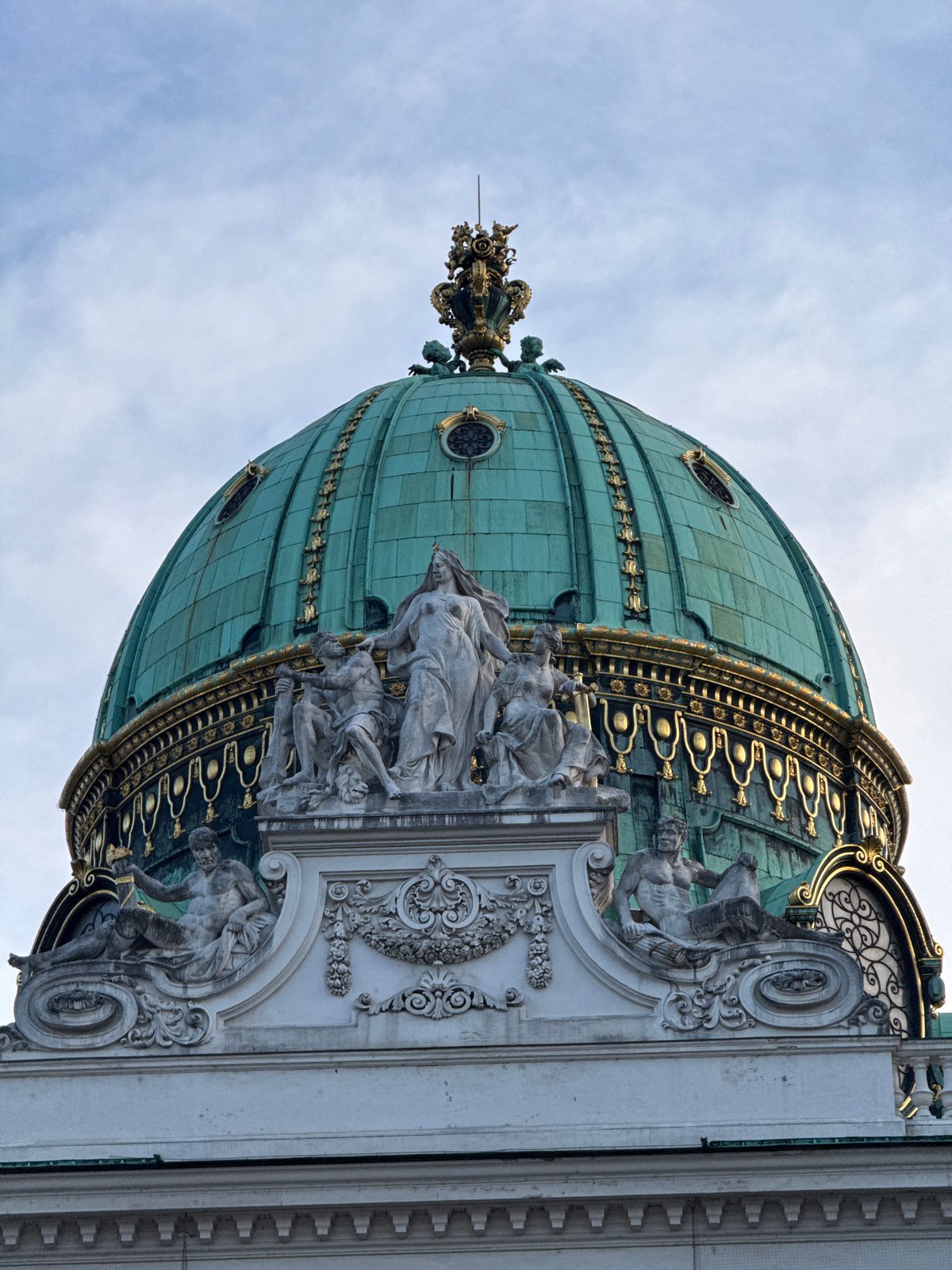 Vienna's grand domes and Baroque facades on a cloudy afternoon