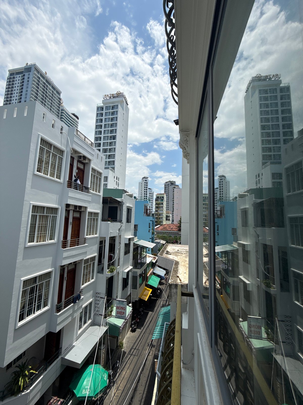 Street-level details of Nha Trang's urban fabric on a sunny morning