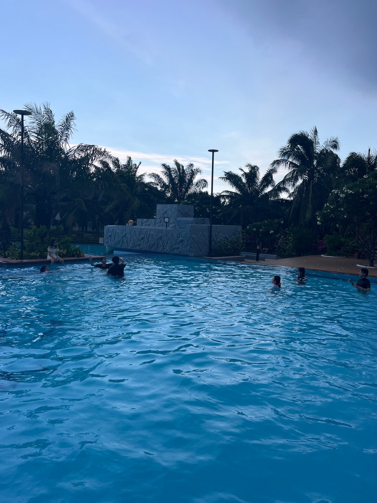 Resort pool day in Vietnam as a storm rolls in