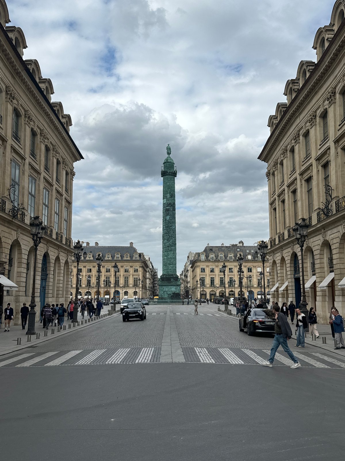 Witnesses document Place Vendôme under cloudy Paris skies