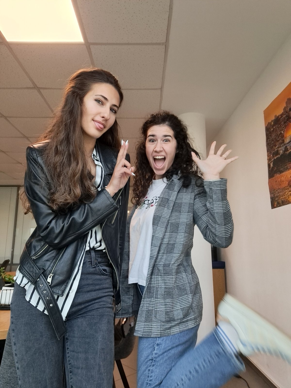 Young women take early morning selfies in Sofia apartment