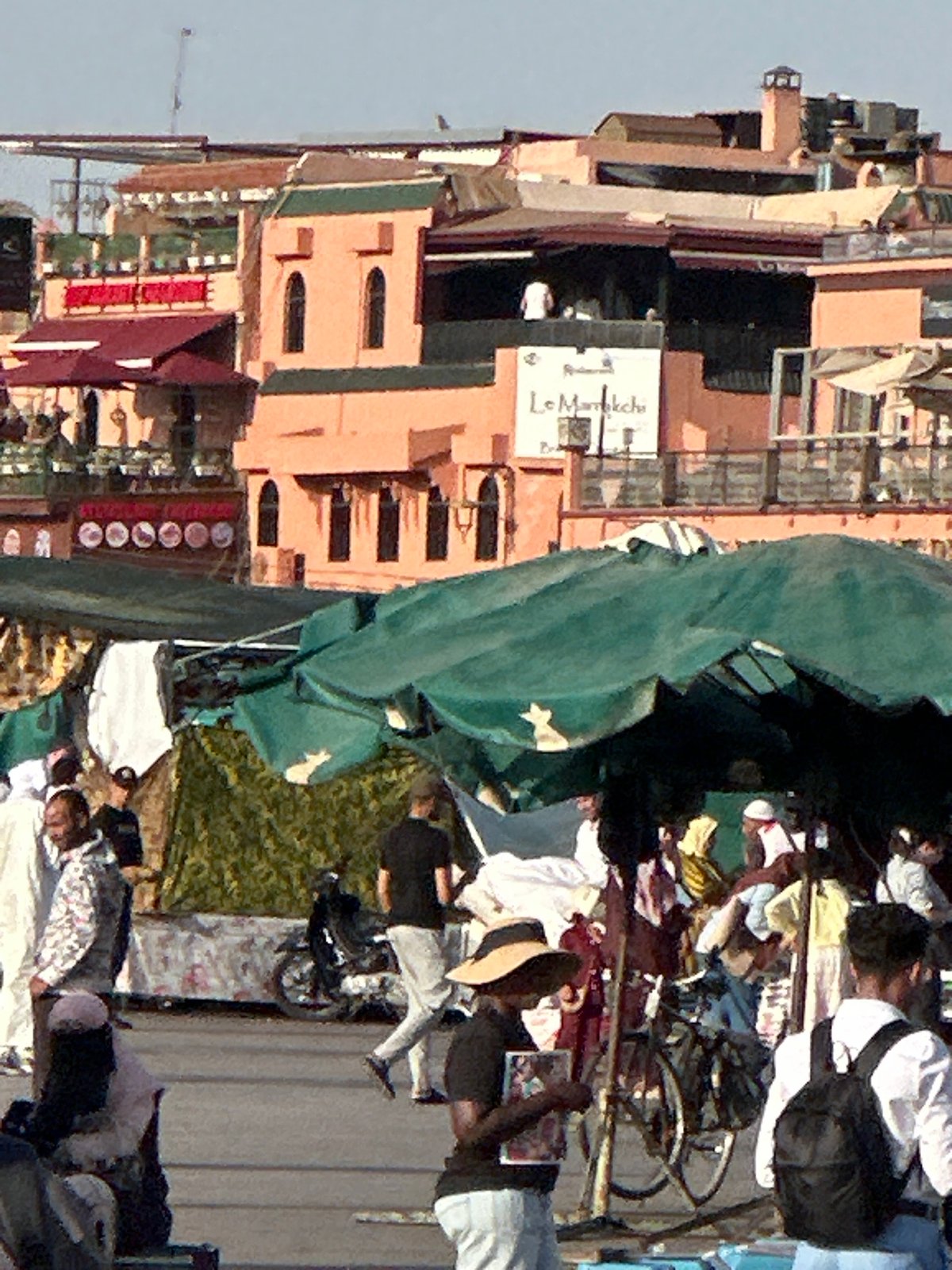 Traditional life documented in Marrakesh public square