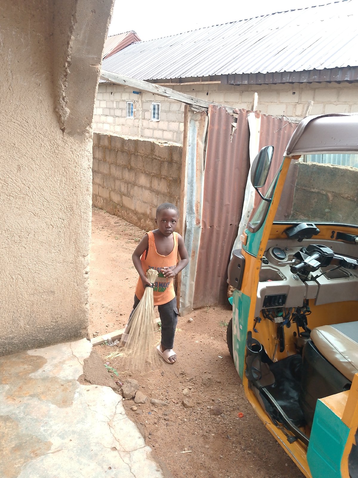 Morning street life documented in Jos, Nigeria neighborhood