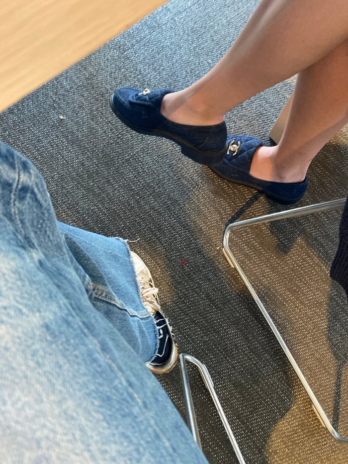 Students study fashion books, laptops in Miami library space