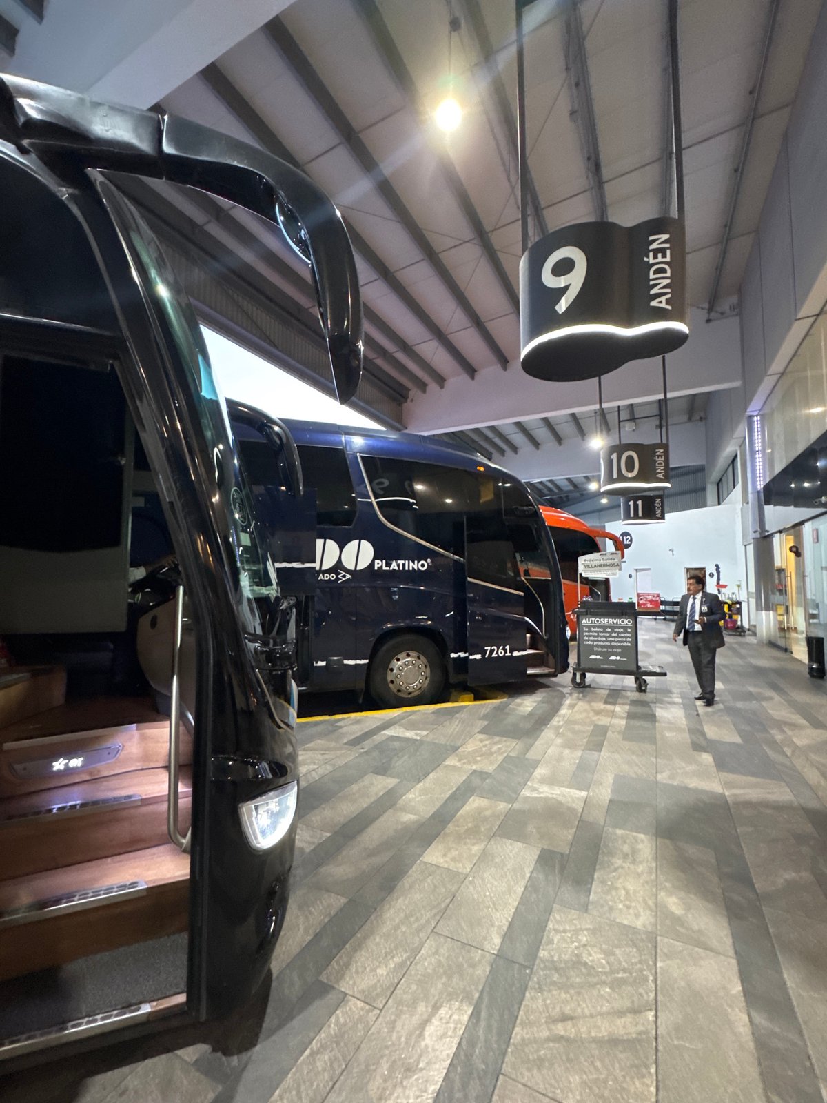 Passenger waits at Puebla bus terminal platform