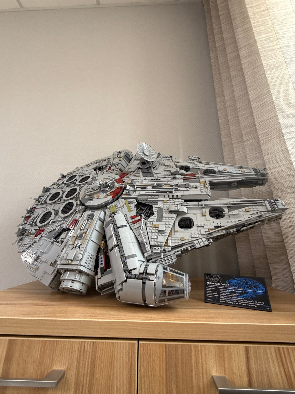 Man takes selfie near LEGO Millennium Falcon in Krasnoyarsk