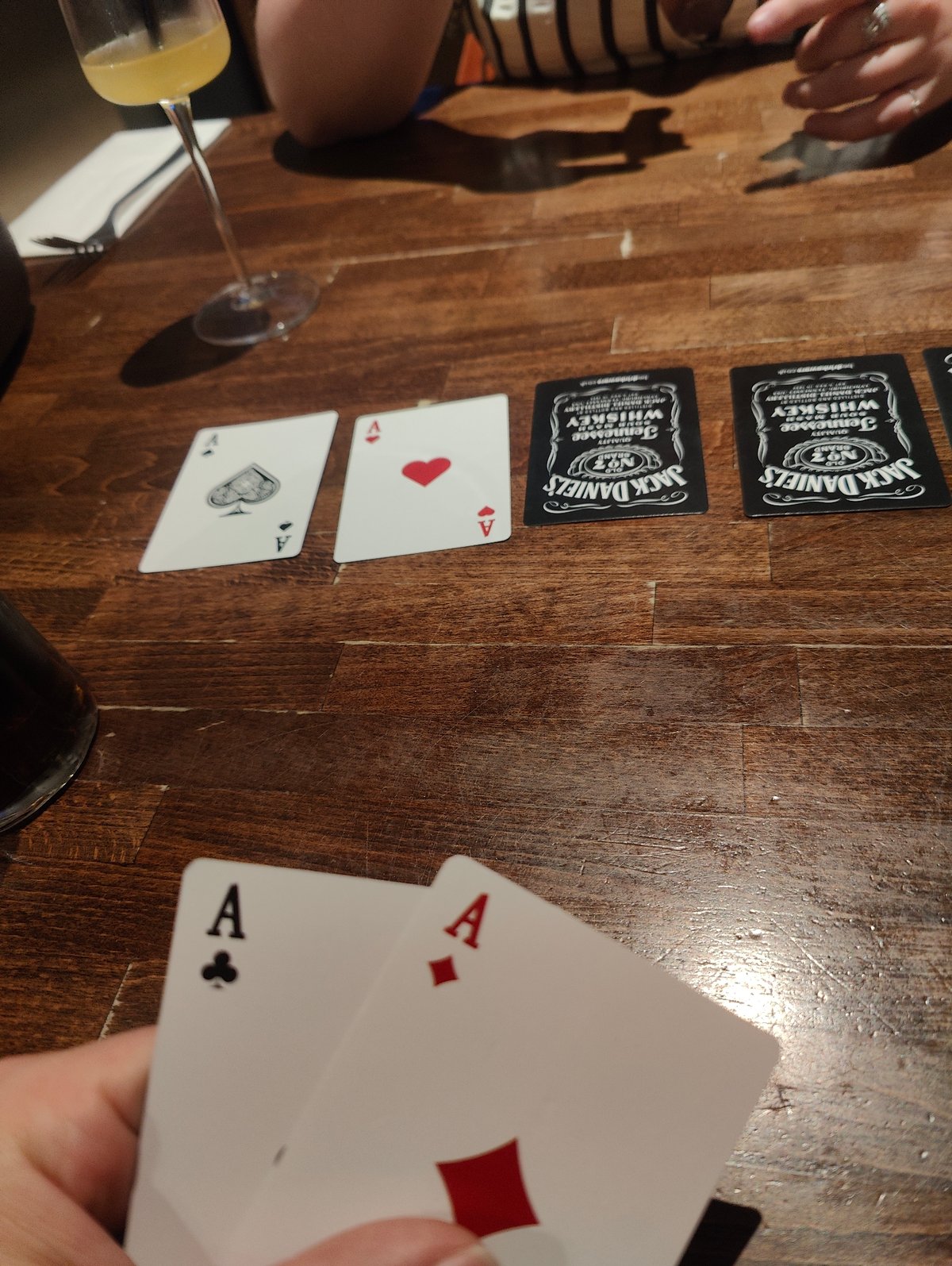 Card game session documented in East Suffolk evening
